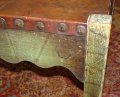 Branded signature on stool.
